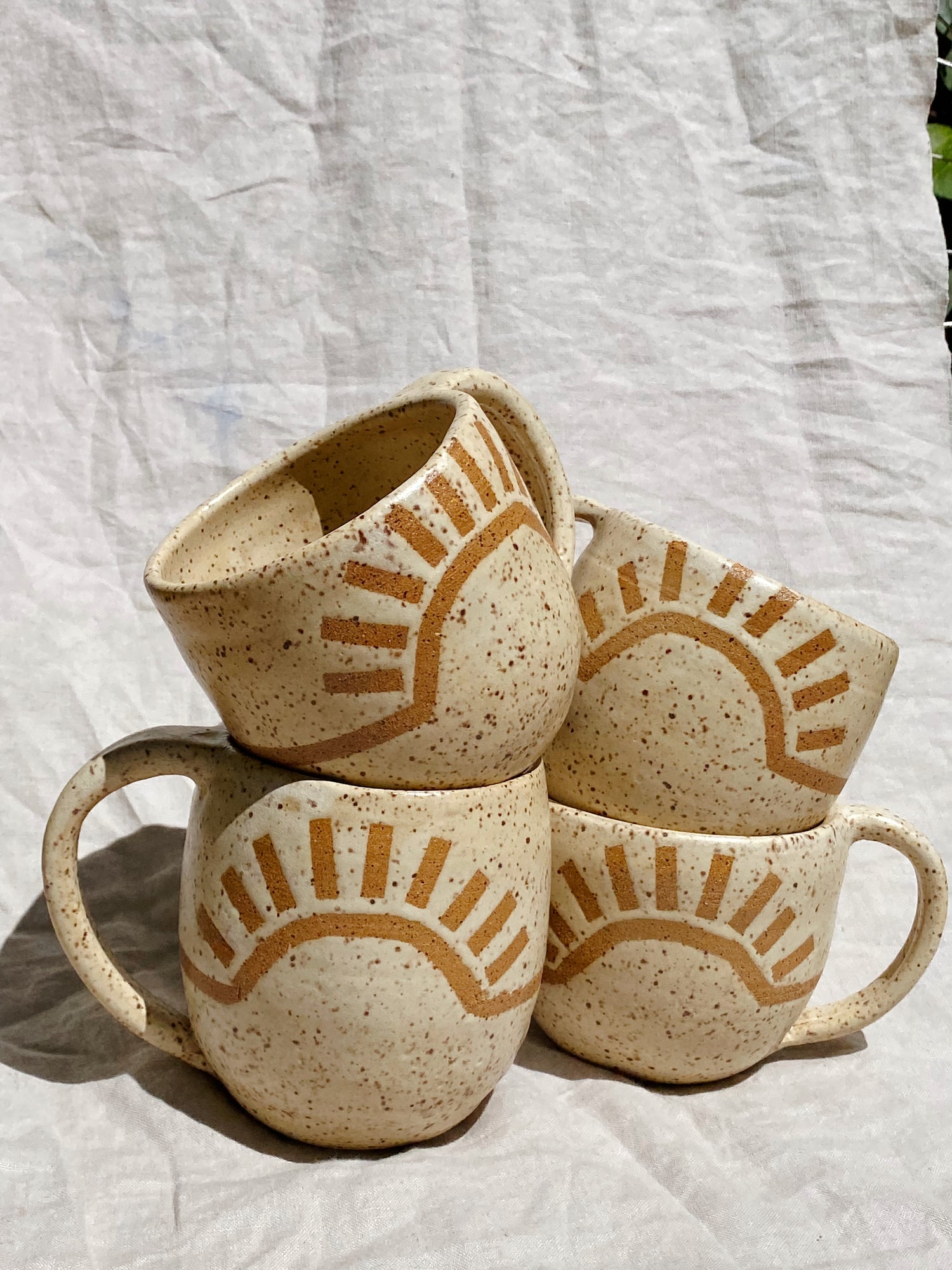 homemade ceramics made in santa cruz, mug with sunshine on them